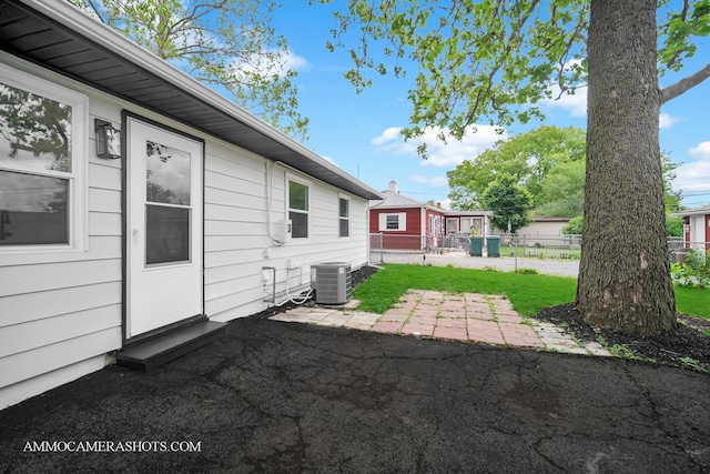 1306 Schriber Ave, Joliet, IL 60435 - view of yard with central AC and a patio area