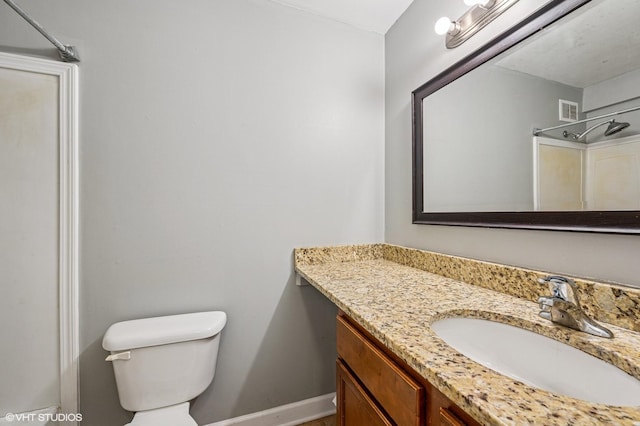 474 N Lake Shore Dr Unit 1701, Chicago, IL 60611 - bathroom featuring vanity, toilet, a shower, and baseboards