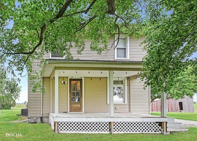 32900 N 2000 E Rd, Dwight, IL 60420 - view of front of home with covered porch, a front lawn, and cooling unit
