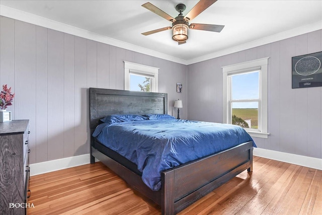 32900 N 2000 E Rd, Dwight, IL 60420 - bedroom with baseboards, light wood-style floors, crown molding, and ceiling fan