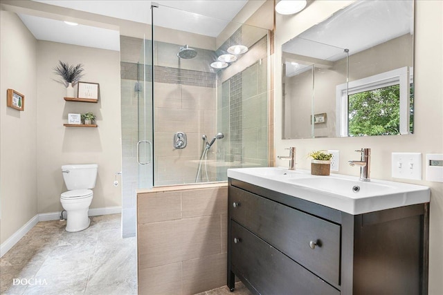 32900 N 2000 E Rd, Dwight, IL 60420 - full bath featuring a shower stall, toilet, double vanity, and baseboards