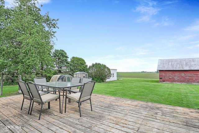32900 N 2000 E Rd, Dwight, IL 60420 - deck featuring a lawn, an outbuilding, and outdoor dining space