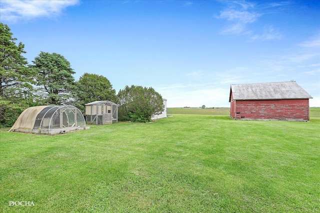 32900 N 2000 E Rd, Dwight, IL 60420 - view of grassy yard with an outdoor structure and a barn