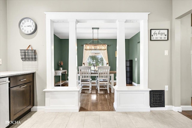32900 N 2000 E Rd, Dwight, IL 60420 - dining area featuring ornate columns and light wood-style floors