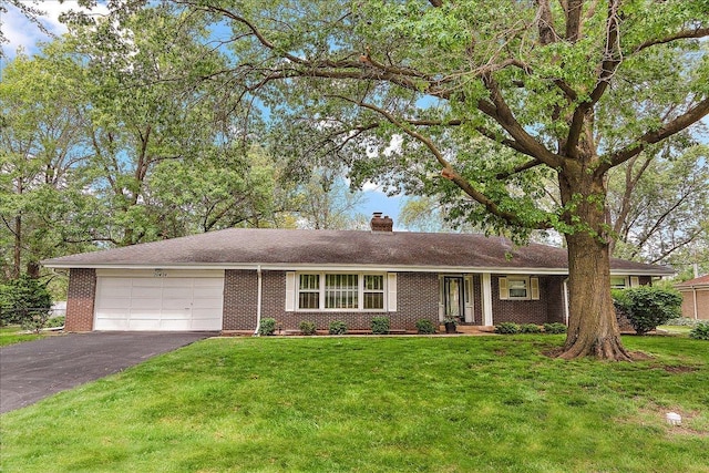 20424 Ithaca Rd, Olympia Fields, IL 60461 - single story home with a garage, a chimney, brick siding, driveway, and a front yard