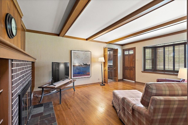 20424 Ithaca Rd, Olympia Fields, IL 60461 - living area featuring wood finished floors, beam ceiling, baseboards, and a fireplace