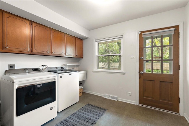 20424 Ithaca Rd, Olympia Fields, IL 60461 - laundry room featuring separate washer and dryer, cabinet space, baseboards, and healthy amount of natural light