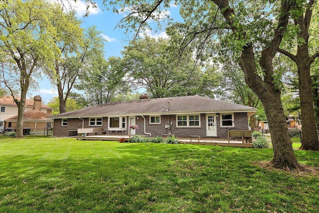 20424 Ithaca Rd, Olympia Fields, IL 60461 - back of house with a deck, brick siding, a yard, and a chimney