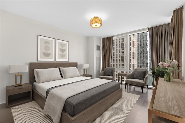 505 N Mcclurg Ct Unit 2003, Chicago, IL 60611 - bedroom featuring a wall of windows and wood finished floors