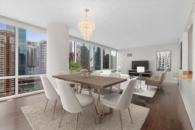 505 N Mcclurg Ct Unit 2003, Chicago, IL 60611 - dining area featuring wood finished floors, a chandelier, baseboards, a view of city, and floor to ceiling windows