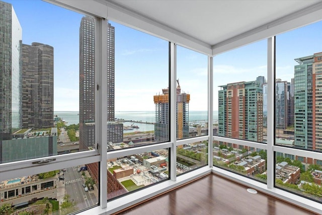 505 N Mcclurg Ct Unit 2003, Chicago, IL 60611 - unfurnished sunroom with a water view and a view of city