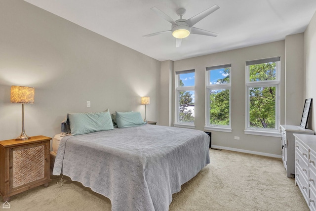 2862 N Paulina St, Chicago, IL 60657 - bedroom featuring baseboards, light colored carpet, and a ceiling fan