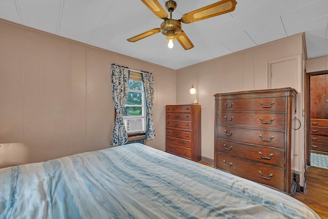 170 E Church St, Coal City, IL 60416 - bedroom with wood finished floors, cooling unit, a ceiling fan, and a decorative wall
