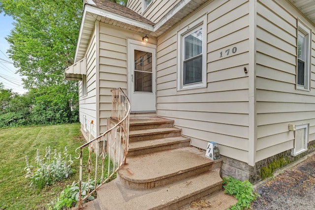 170 E Church St, Coal City, IL 60416 - view of exterior entry featuring a yard and roof with shingles