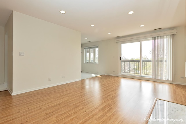 300 E Dundee Rd Unit 402, Buffalo Grove, IL 60089 - unfurnished room with light wood-style floors, recessed lighting, and baseboards