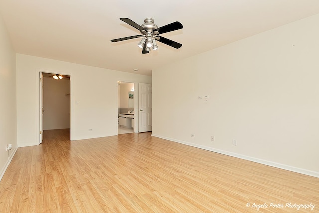 300 E Dundee Rd Unit 402, Buffalo Grove, IL 60089 - spare room with a ceiling fan, light wood-type flooring, and baseboards