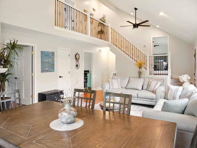 500 Muscovy Ln, Bloomingdale, IL 60108 - dining area with ceiling fan, high vaulted ceiling, stairs, wood finished floors, and baseboards