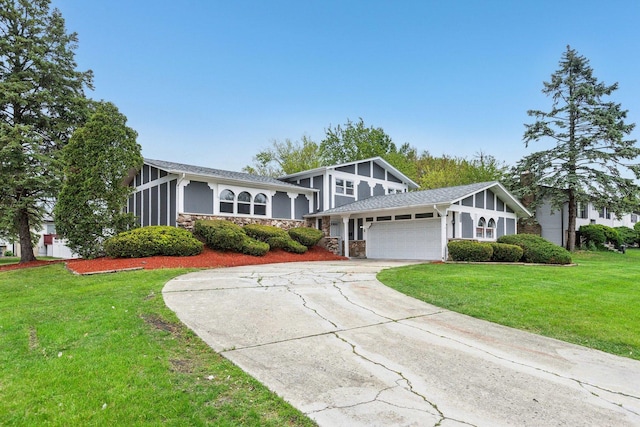 18951 Willow Ave, Country Club Hills, IL 60478 - mid-century home featuring stone siding, an attached garage, driveway, and a front lawn