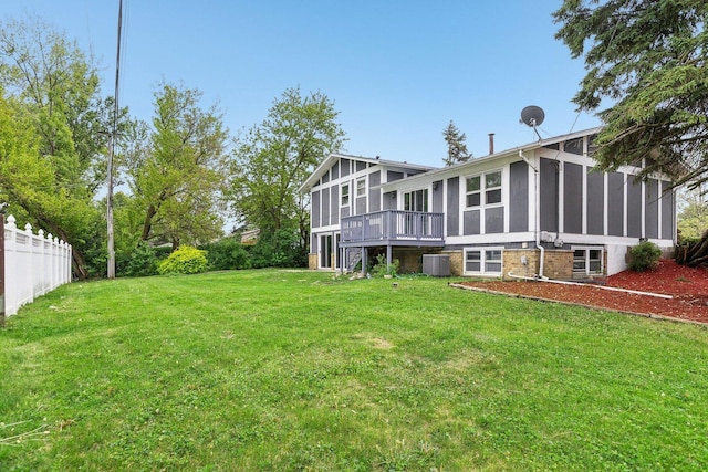 18951 Willow Ave, Country Club Hills, IL 60478 - view of grassy yard with central air condition unit, a wooden deck, and a sunroom