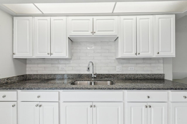 18951 Willow Ave, Country Club Hills, IL 60478 - kitchen with a sink, white cabinetry, decorative backsplash, and dark stone countertops