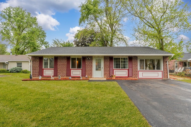 128 Seabury Rd, Bolingbrook, IL 60440 - single story home featuring brick siding and a front yard
