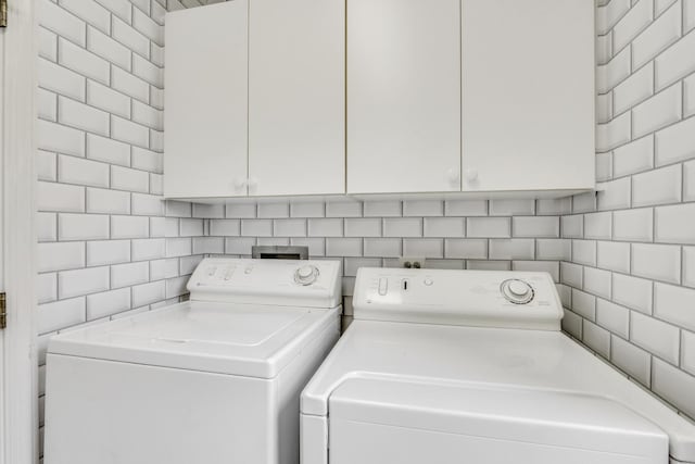 1700 Cornell Ct, Lake Forest, IL 60045 - laundry area featuring separate washer and dryer and cabinet space