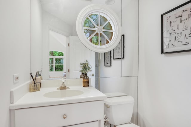 1700 Cornell Ct, Lake Forest, IL 60045 - half bathroom featuring vanity and toilet