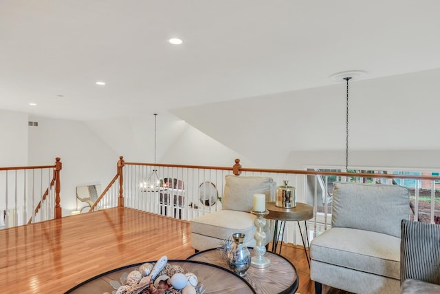 1700 Cornell Ct, Lake Forest, IL 60045 - living area featuring vaulted ceiling, wood finished floors, recessed lighting, an upstairs landing, and a chandelier