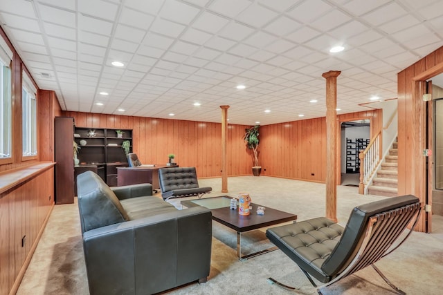 1700 Cornell Ct, Lake Forest, IL 60045 - living area featuring wooden walls, stairs, and light colored carpet