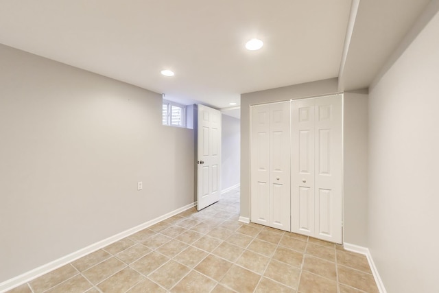 7665 W Victoria St, Chicago, IL 60631 - unfurnished bedroom featuring recessed lighting, light tile patterned flooring, baseboards, and a closet