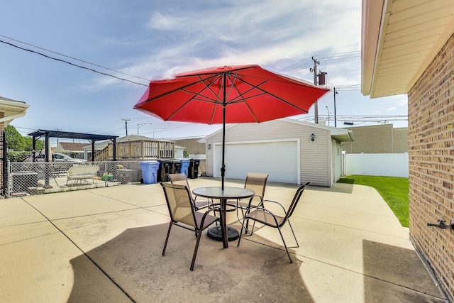 7665 W Victoria St, Chicago, IL 60631 - fenced backyard featuring an outbuilding, a garage, a patio, and outdoor dining space