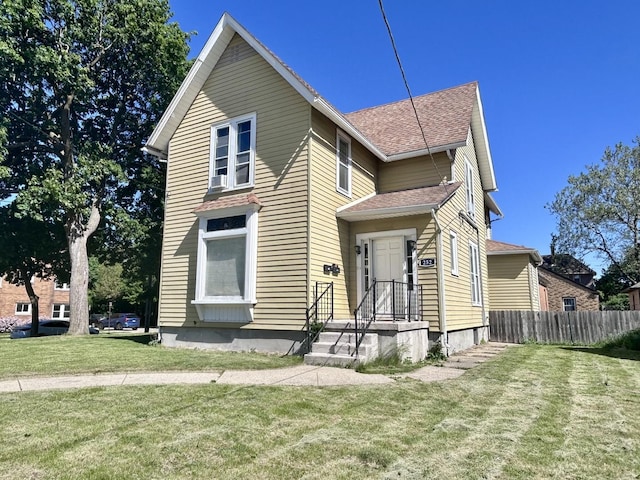 252 Jefferson Ave, Elgin, IL 60120 - view of front of property featuring roof with shingles