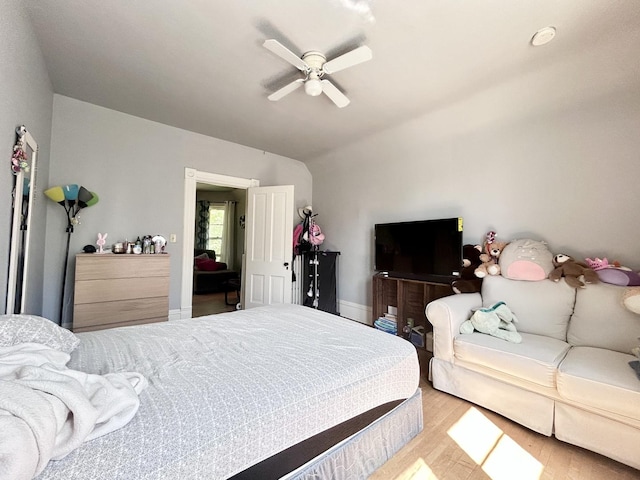 252 Jefferson Ave, Elgin, IL 60120 - bedroom featuring lofted ceiling, light wood-style flooring, ceiling fan, and baseboards