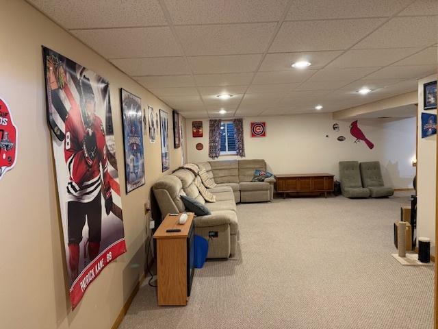 1201 E St, Crete, IL 60417 - carpeted living area featuring a paneled ceiling and recessed lighting