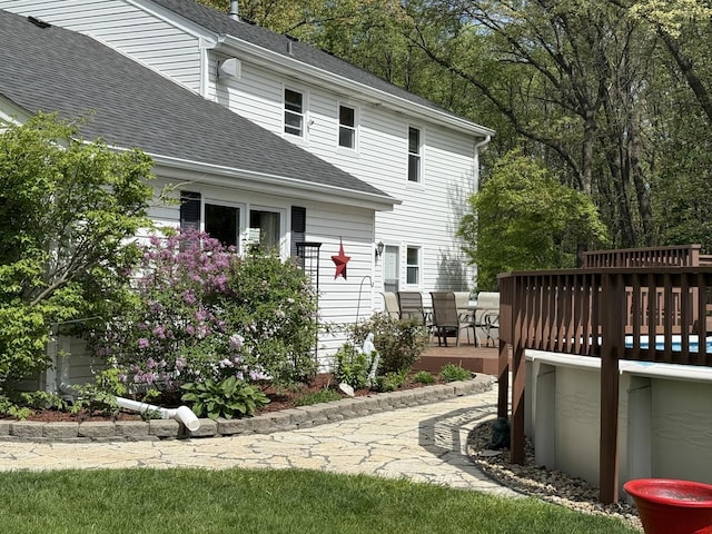 1201 E St, Crete, IL 60417 - back of property featuring a deck and a shingled roof