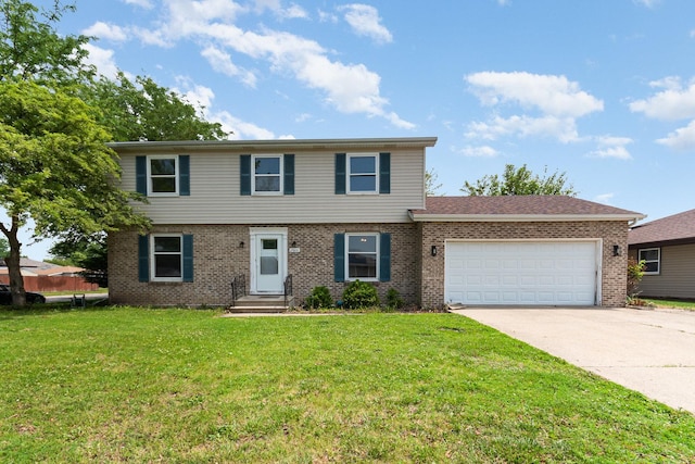 2600 John Bourg Dr, Plainfield, IL 60586 - view of front of house with brick siding, an attached garage, driveway, a front yard, and entry steps
