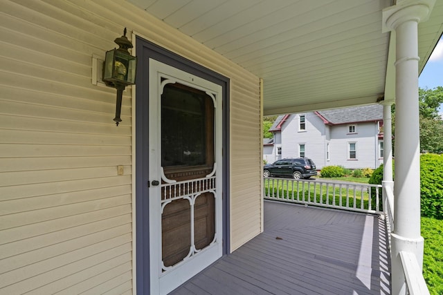 508 Grant St, Earlville, IL 60518 - view of exterior entry featuring a porch and an attached carport
