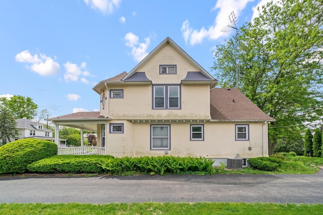 508 Grant St, Earlville, IL 60518 - view of property exterior with cooling unit and roof with shingles