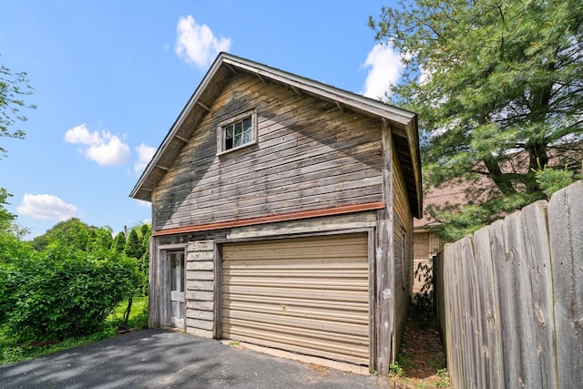 508 Grant St, Earlville, IL 60518 - garage featuring asphalt driveway