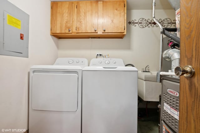 4009 W 93rd Pl Unit 2B, Oak Lawn, IL 60453 - laundry area featuring electric panel, washing machine and dryer, and cabinet space