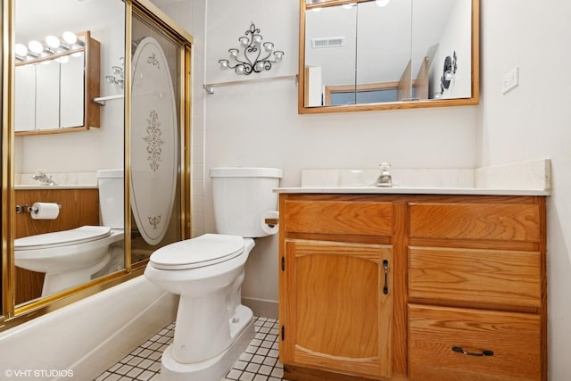 4009 W 93rd Pl Unit 2B, Oak Lawn, IL 60453 - bathroom featuring toilet, vanity, an enclosed shower, and tile patterned floors