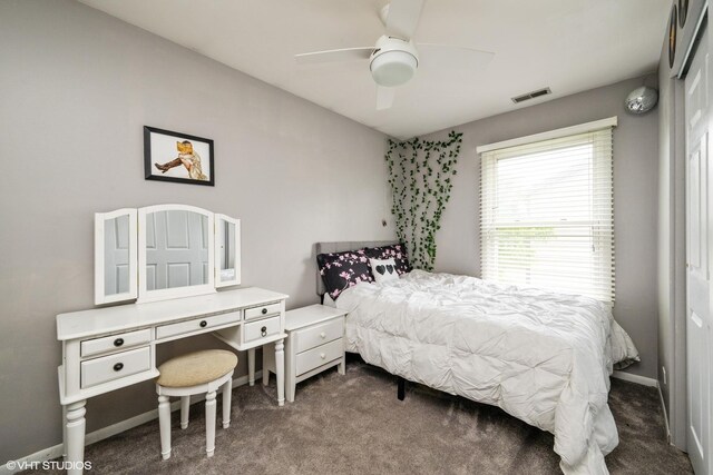 524 Crown Point Dr, Buffalo Grove, IL 60089 - bedroom with dark colored carpet and a ceiling fan