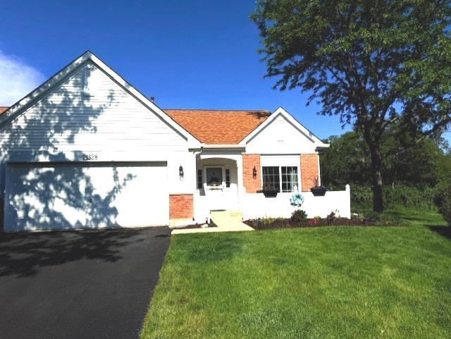 21528 W Douglas Court -, Plainfield, IL 60544 - view of front of house with a front yard, an attached garage, and asphalt driveway