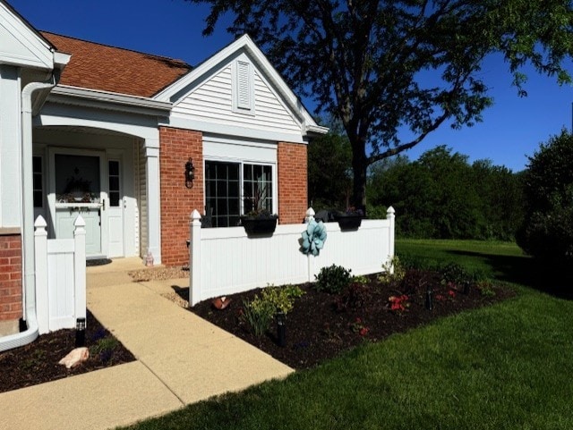 21528 W Douglas Court -, Plainfield, IL 60544 - doorway to property with brick siding, a yard, and a shingled roof