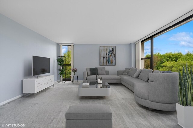 1850 N Clark St Unit 402, Chicago, IL 60614 - carpeted living area with a wall of windows and baseboards