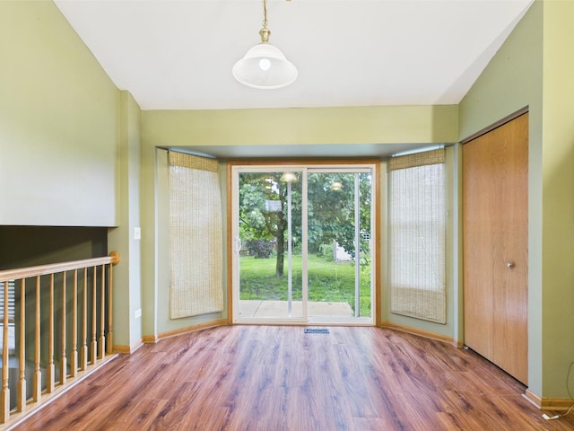 364 Coneflower Dr, Minooka, IL 60447 - unfurnished room featuring wood finished floors and baseboards