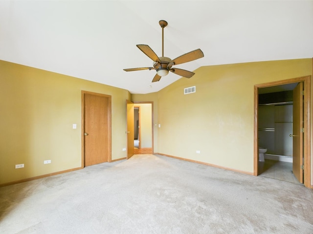 364 Coneflower Dr, Minooka, IL 60447 - unfurnished bedroom with vaulted ceiling, baseboards, light colored carpet, and ceiling fan