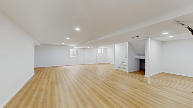 2156 Skylane Dr, Naperville, IL 60564 - basement featuring recessed lighting, light wood-type flooring, baseboards, and stairs