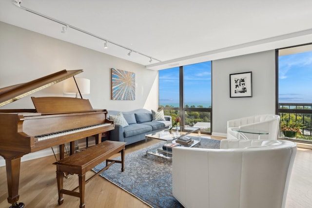2314 N Lincoln Park W Unit 11S, Chicago, IL 60614 - living area featuring track lighting and wood finished floors