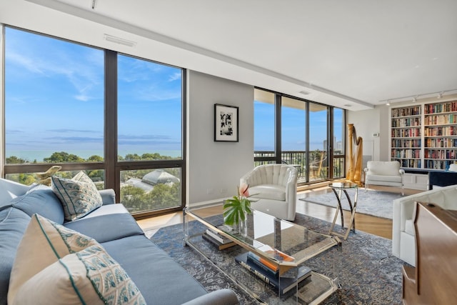 2314 N Lincoln Park W Unit 11S, Chicago, IL 60614 - living area with wood finished floors and expansive windows